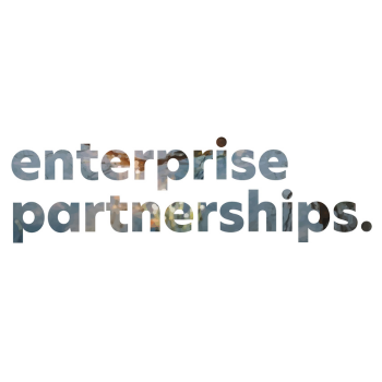 “Enterprise partnerships” text with landscape imagery subtly visible within the letters.